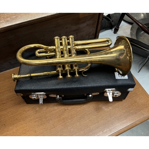 156 - A cased trumpet