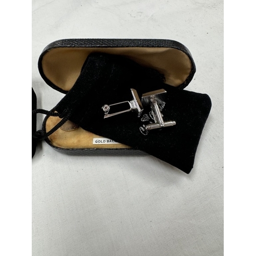 157 - Four pairs of cuff links including aircraft related etc.,