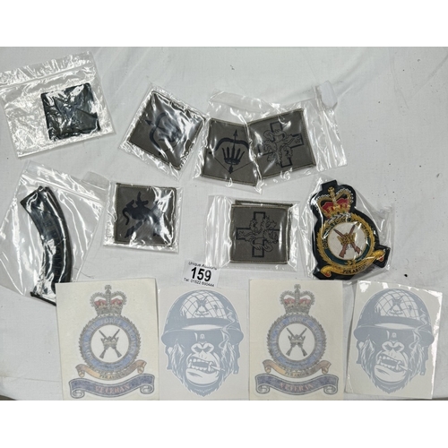 159 - A quantity of cloth badges and patches etc.,