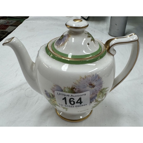 164 - A Royal Doulton hand painted teapot signed P Curnock.