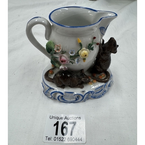 167 - A continental porcelain ornament of Mice & A milk jug