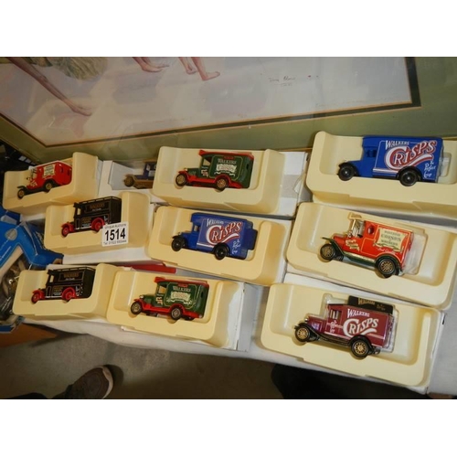 1514 - Twelve boxed die cast models including trade vehicles.