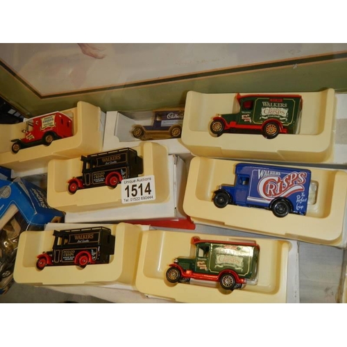 1514 - Twelve boxed die cast models including trade vehicles.