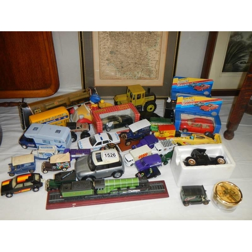 1526 - A mixed lot of play worn die cast models.