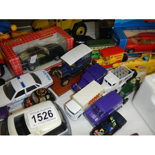 1526 - A mixed lot of play worn die cast models.