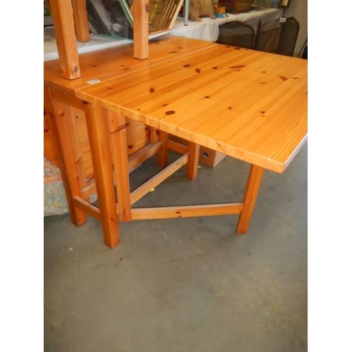 1538 - A good pine drop leaf table and a pine coffee table. COLLECT ONLY.