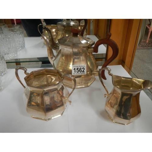 1562 - A three piece silver plate tea set.