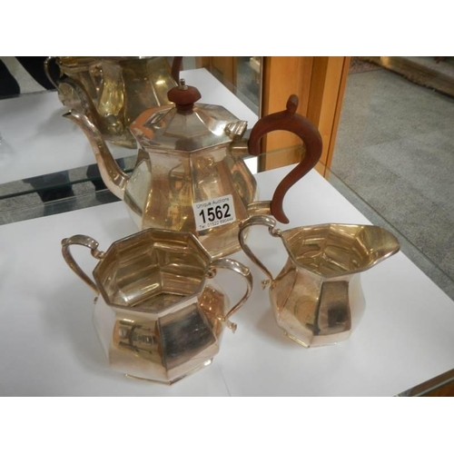 1562 - A three piece silver plate tea set.