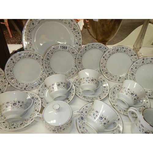 1569 - A 21 piece porcelain tea set, COLLECT ONLY.