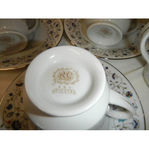 1569 - A 21 piece porcelain tea set, COLLECT ONLY.