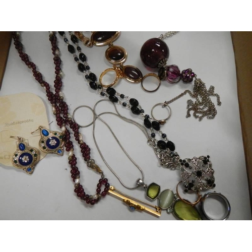 1578 - A mixed lot of costume jewellery including stone set necklaces.