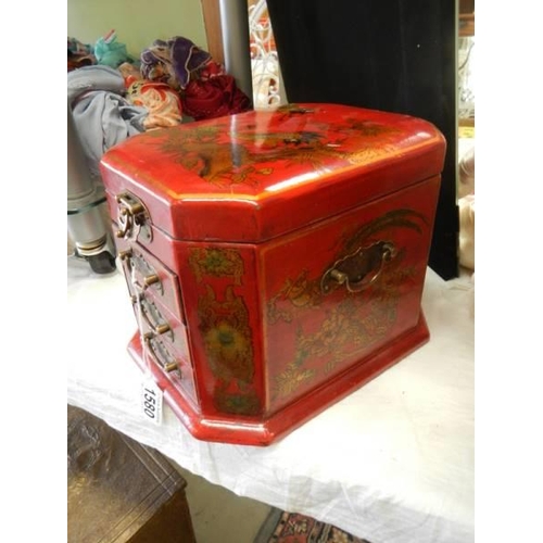 1580 - A good quality red lacquered jewellery casket.