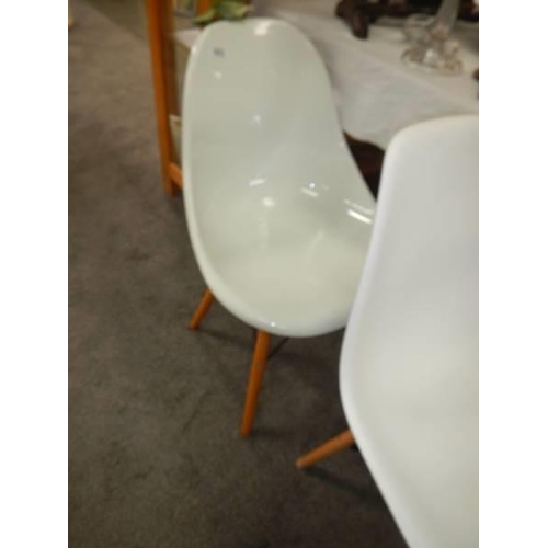 1602 - A pair of retro style plastic chairs. COLLECT ONLY.