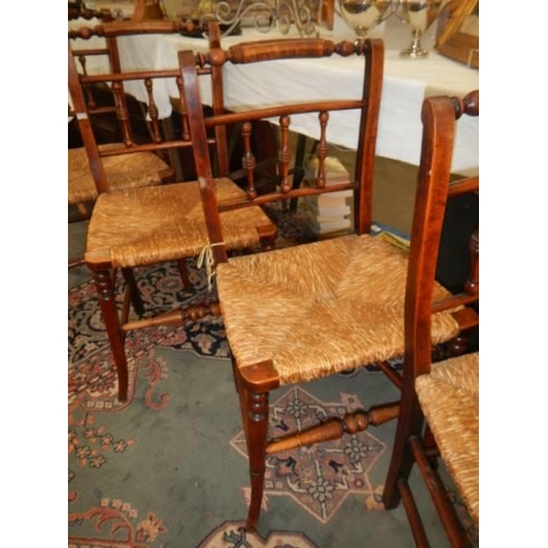 1603 - A set of four rush seated kitchen chairs, COLLECT ONLY.