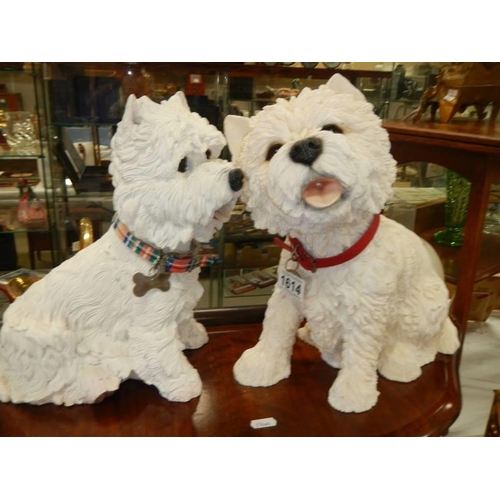 1614 - Two scottie dog figures.