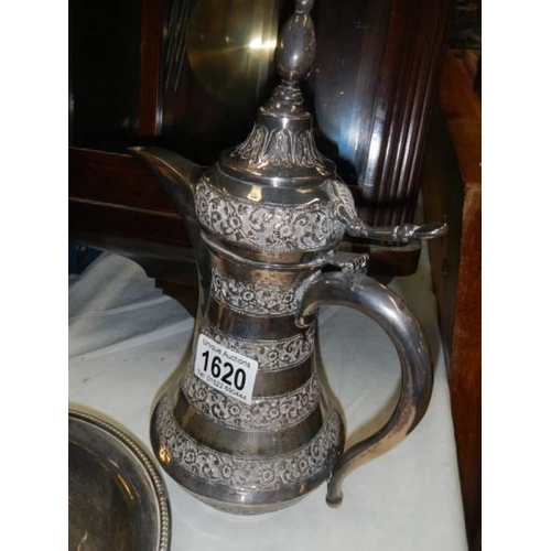 1620 - A good Turkish coffee pot (possibly silver) and a silver plate chamber stick.