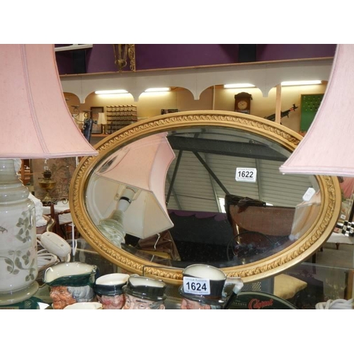 1622 - An oval gilt framed bevel edged mirror, COLLECT ONLY.