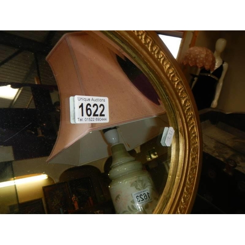 1622 - An oval gilt framed bevel edged mirror, COLLECT ONLY.