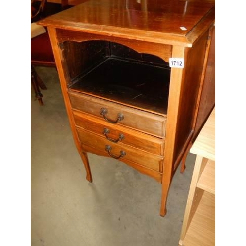 1712 - A 20th century mahogany music cabinet, COLLECT ONLY.