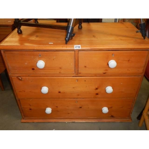 1719 - An early 20th century two over two pine chest of drawers, COLLECT ONLY.