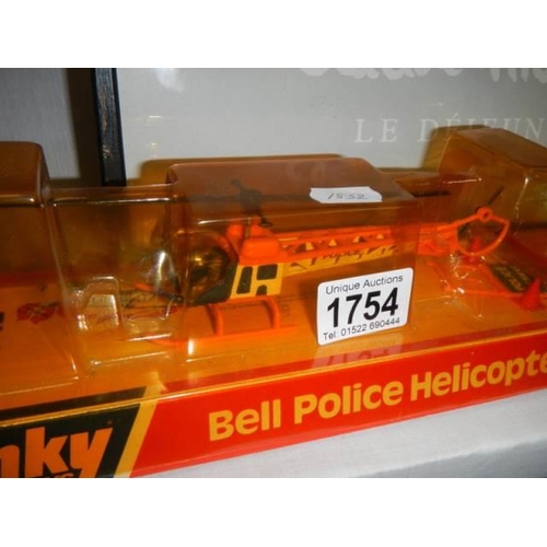 1754 - 2 Dinky Bell police helicopters in packaging