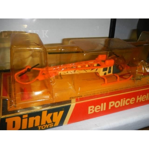 1754 - 2 Dinky Bell police helicopters in packaging