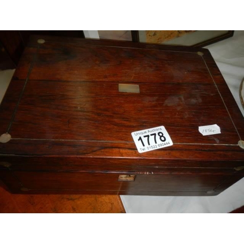 1778 - A cutlery box with some cutlery and 1 other box