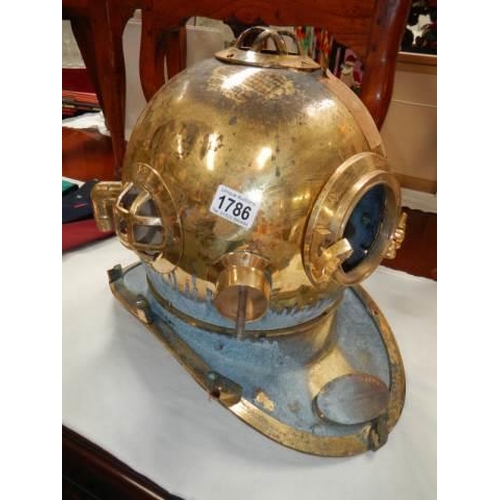 1786 - A large brass deep sea divers ornate helmet