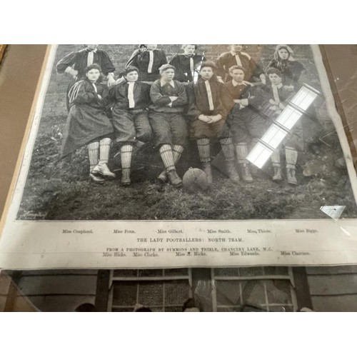 1690 - A framed & glazed picture The Lady Footballers North & South team. A Photograph by Symmons and Thiel... 