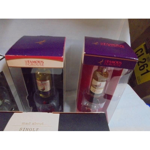 1156 - Four Famous Grouse gift sets and two others.