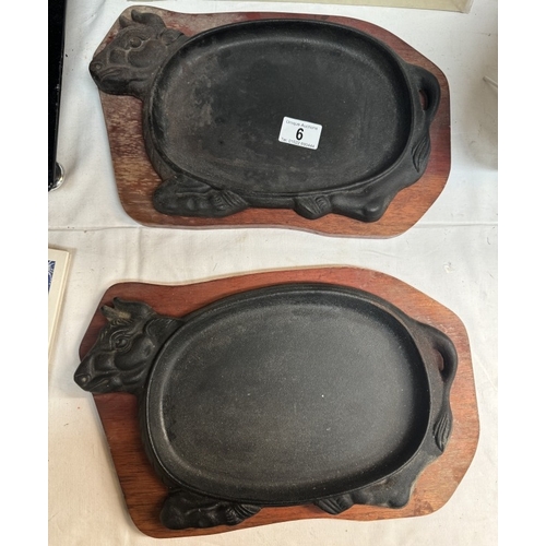 6 - 2 Cast iron serving hot plates on wooden bases