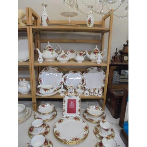 1337 - Approximately 55 pieces of Royal Albert Old Country Roses tea and dinner ware, COLLECT ONLY.