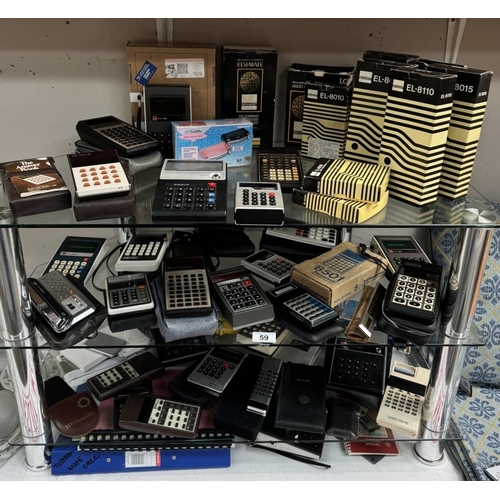 59 - An excellent collection of vintage calculators.