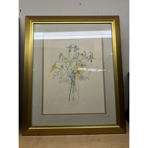 64 - A pair of gilt framed prints of still life flowers 49 x 59cm