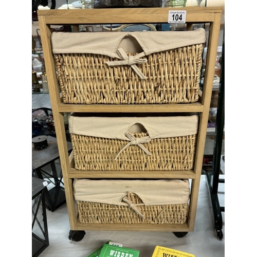 104 - A 3 drawer Wicker storage unit