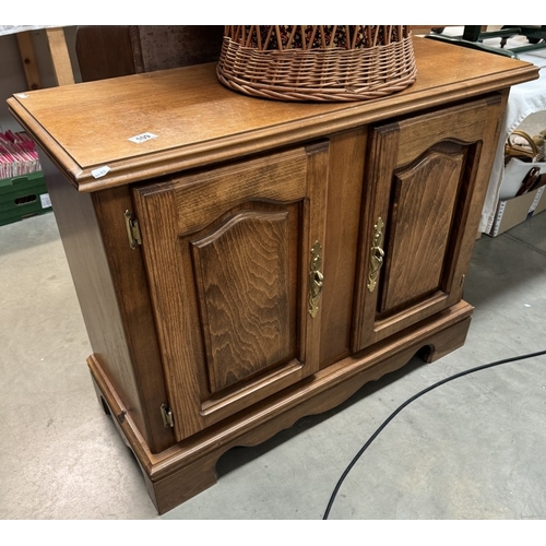 109 - A teak effect 2 door cupboard 100 x 42 x height 81cm