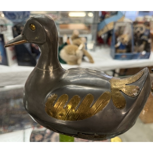 136 - A quantity of ducks etc, in metal, wood and ceramic, 2 of which have lids