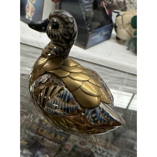 136 - A quantity of ducks etc, in metal, wood and ceramic, 2 of which have lids