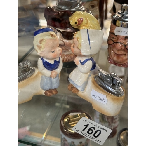 160 - A quantity of character jug table lighters, also includes poodle and Dutch boy and girl on clogs