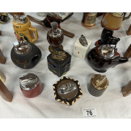 76 - A collection of vintage novelty table lighters