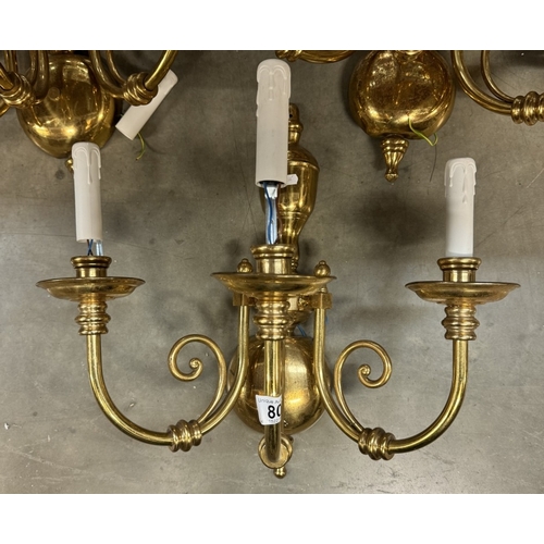 80 - 4 large 3 arm brass wall lights