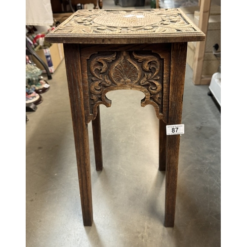 87 - An arts and crafts oak plant stand