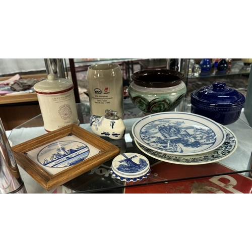 92 - A mixed lot of pottery, china etc on 2 shelves including Delft