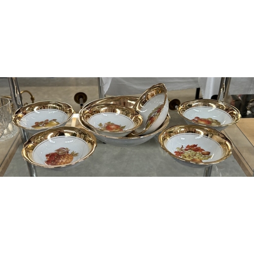 165 - A gold coloured coffee set & dessert set