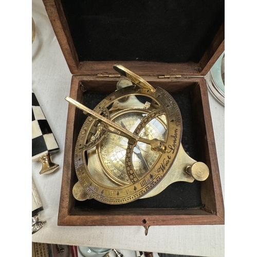 199 - A brass compass / sundial in hardwood case