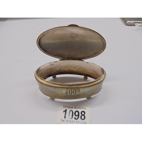 1098 - An oval silver trinket box, no liner and not bottom.