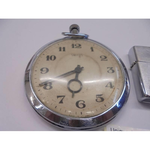 1100D - WW2 related - A large Smith's pocket watch with inscription 1943 and a lighter with inscription 1944... 