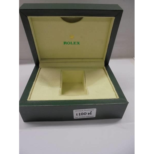 1100N - An empty Rolex watch box.