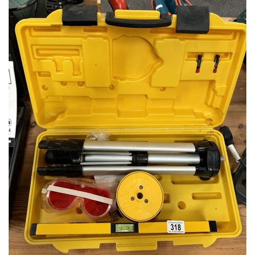 318 - A cased Power Master spirit level & tripod