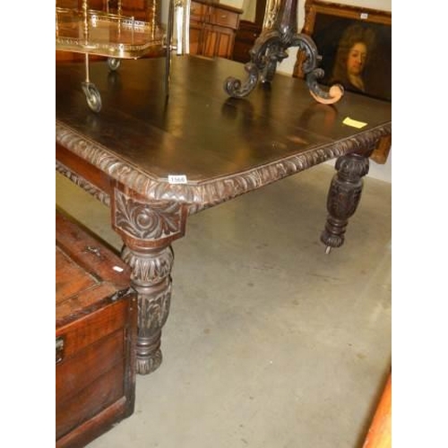 1560 - An old oak wind out table with carved edge and carved legs (no leaves) in need of restoration, COLLE... 